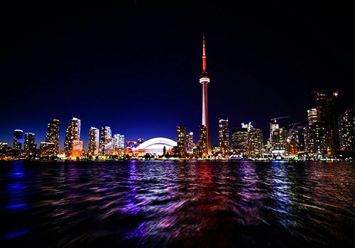 Toronto skyline and CN Tower at dusk